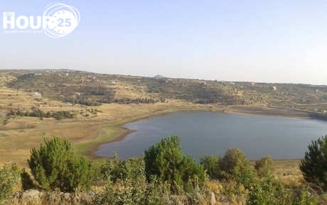 منخفض جوي سطحي وفرصة لهطول الأمطار